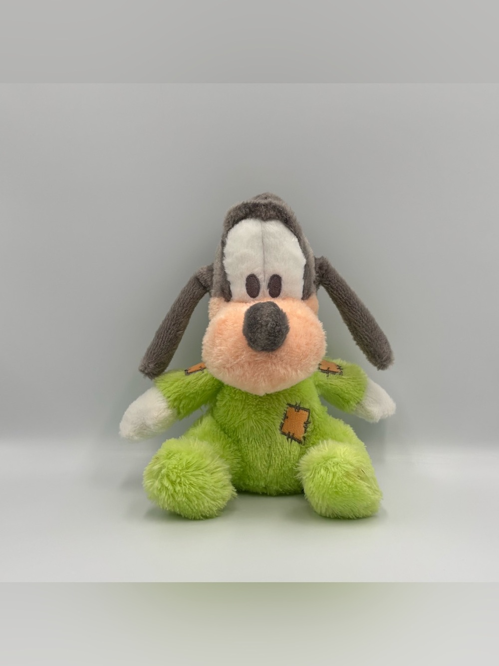Disney Park Baby Goofy Green Pajamas Bell Rattle Toy Plush Stuffed Animal 9"